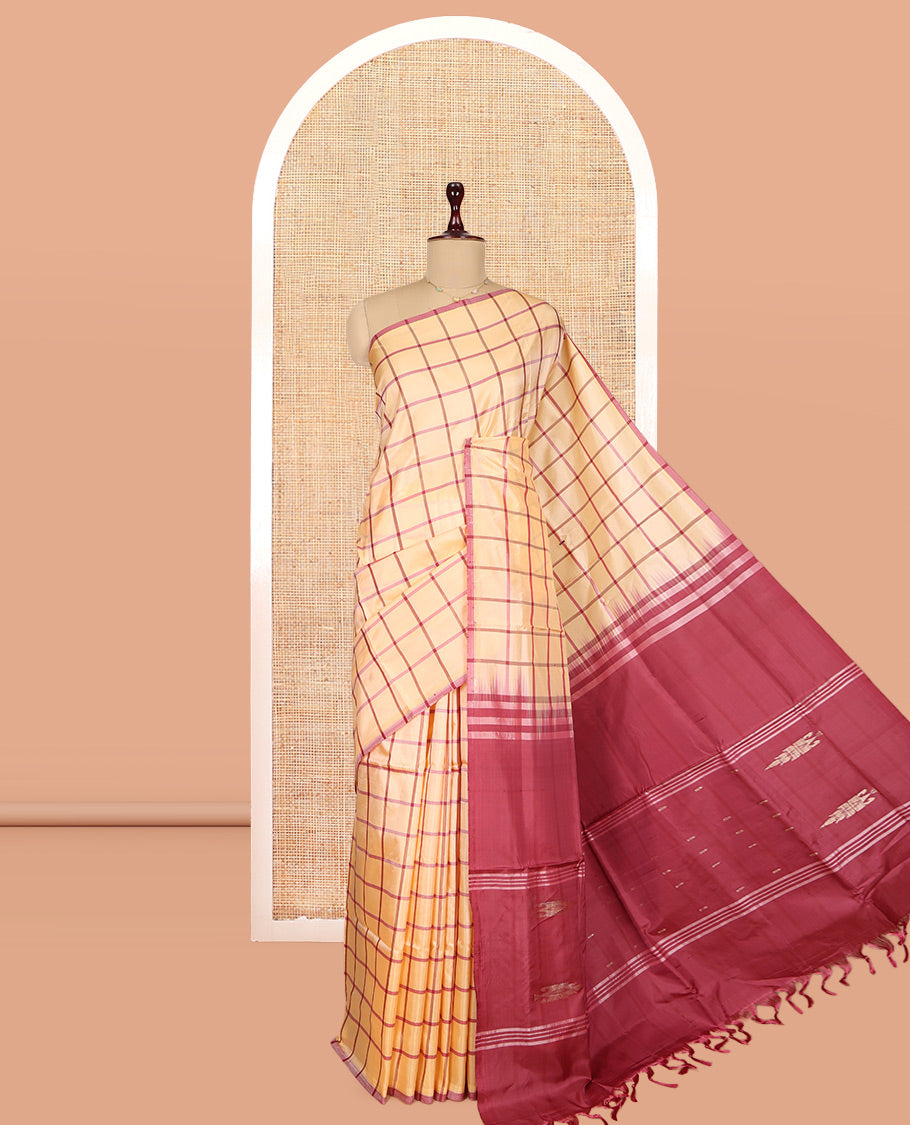 Borderless Sandal Checked Banana Pith Saree, Complemented by a Contrast Pallu of Stripes and Buttas, and a Contrast Blouse