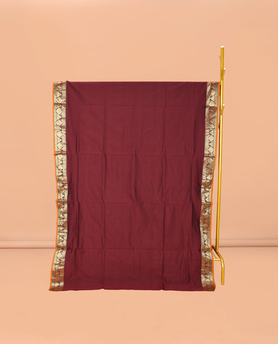 Maroon Plain Poly Cotton Saree, Complemented by a Contrast Traditional Zari Border of Temple and Rudraksham Designs, Contrast Striped Pallu, and Paired with a Contrast Blouse