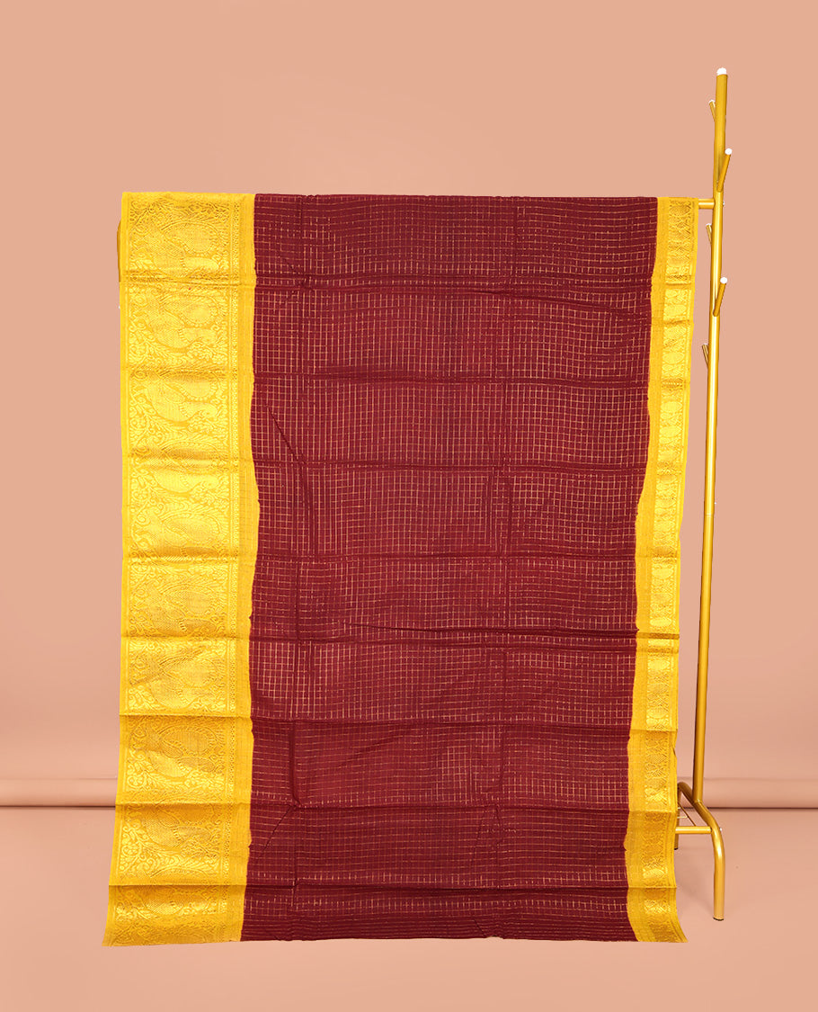 Maroon Sungudi Cotton Saree, Mesmerized with Zari Checks on Its Body, Complemented by a Contrast Traditional Zari Border of Big Peacocks, Zari-Striped Pallu, and Paired with a Contrast Blouse