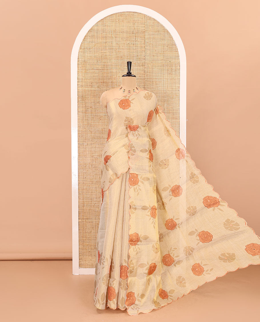 Gold and orange rose motifs printed with mirror work tissue saree, scallop embroidered border, printed pallu, and a contrast blouse