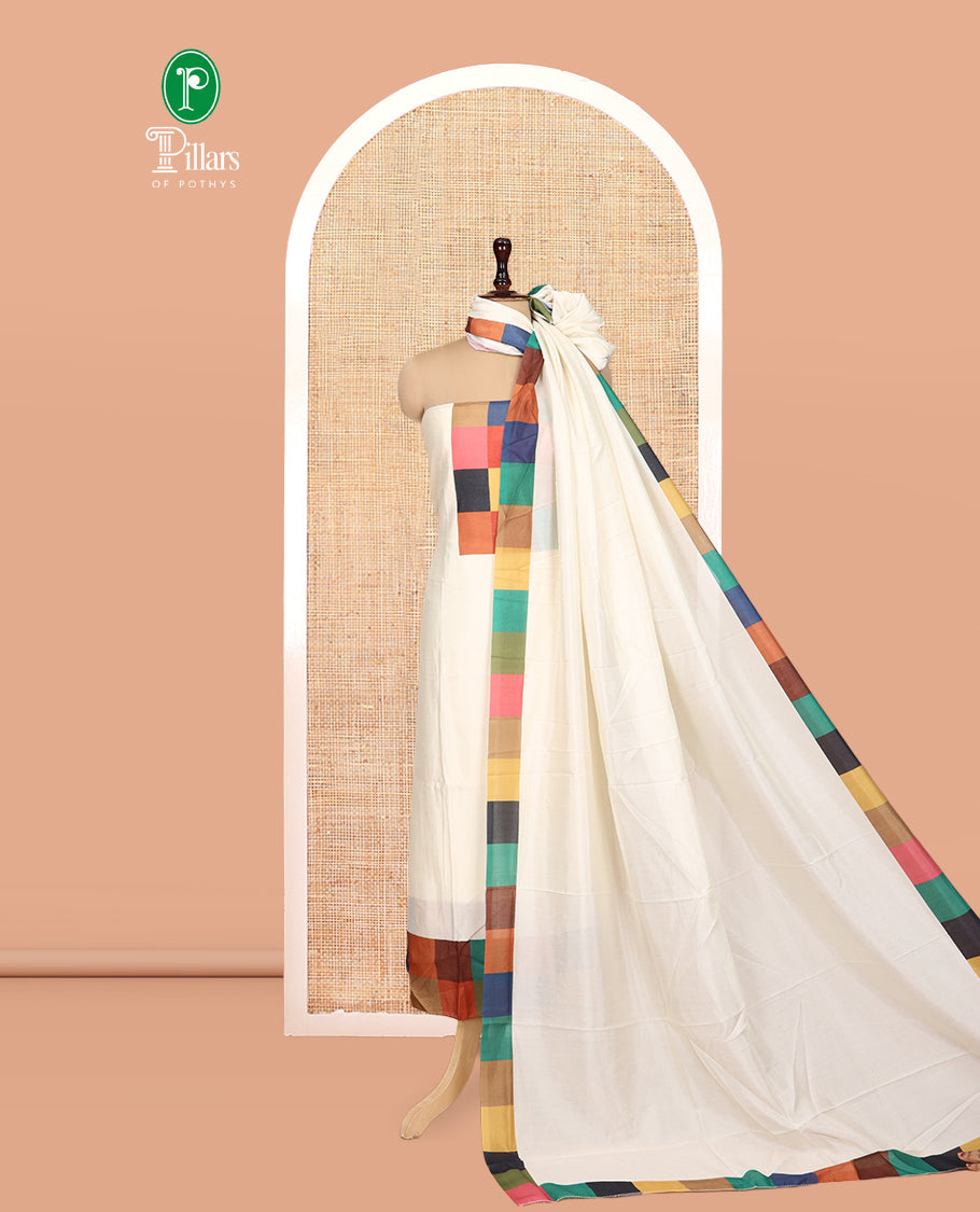 Cream Semi-Silk Material Churidar, Ornamented with Multi-Color Checked Top, a Plain Bottom, a Checked Bordered Plain Dupatta