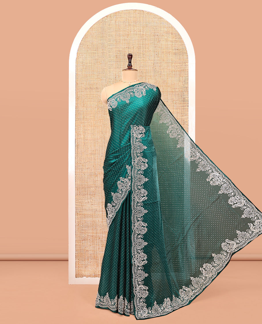 Green Designer Saree, Entralled with Stone Struck All Over Its Body, Highlighted by Peacock Stone Work Border, and Paired with a Matching Blouse