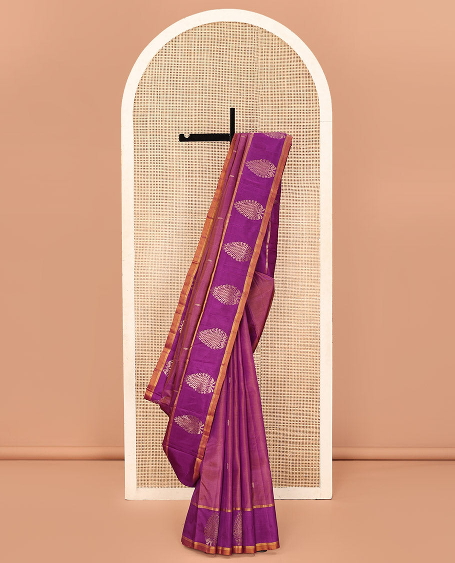 Purple Kanchipuram Silk Saree, Embellished with Zari Buttas All Over Its Body, Complemented by a Contrast Border of Zari Designs, Intricate Motifs Woven Pallu, and Paired with a Contrast Blouse