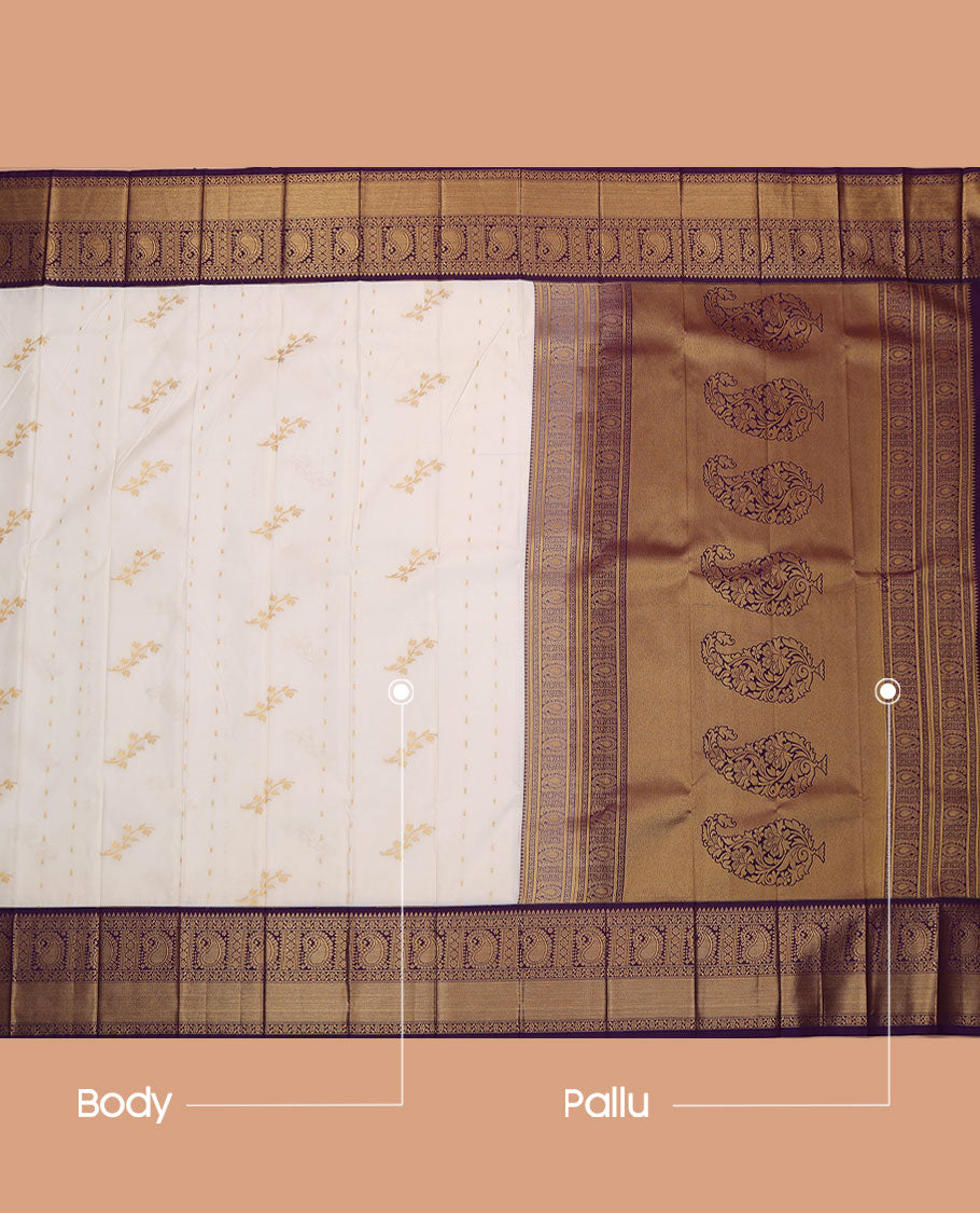 Cream Budget Silk Saree, Showcasing Zari Buttas All Over Its Body, Complemented by a Contrast Traditional Zari Design Border of Paisleys, Pallu Features Paisley Designs, and Paired with a Contrast Blouse