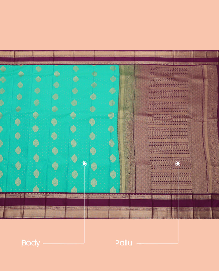 Turquoise Budget Silk Saree Featuring Zari Buttas, Complemented by a Contrast Traditional Zari Design Rettai Pettu Border, Grand Pallu, and a Contrast Blouse