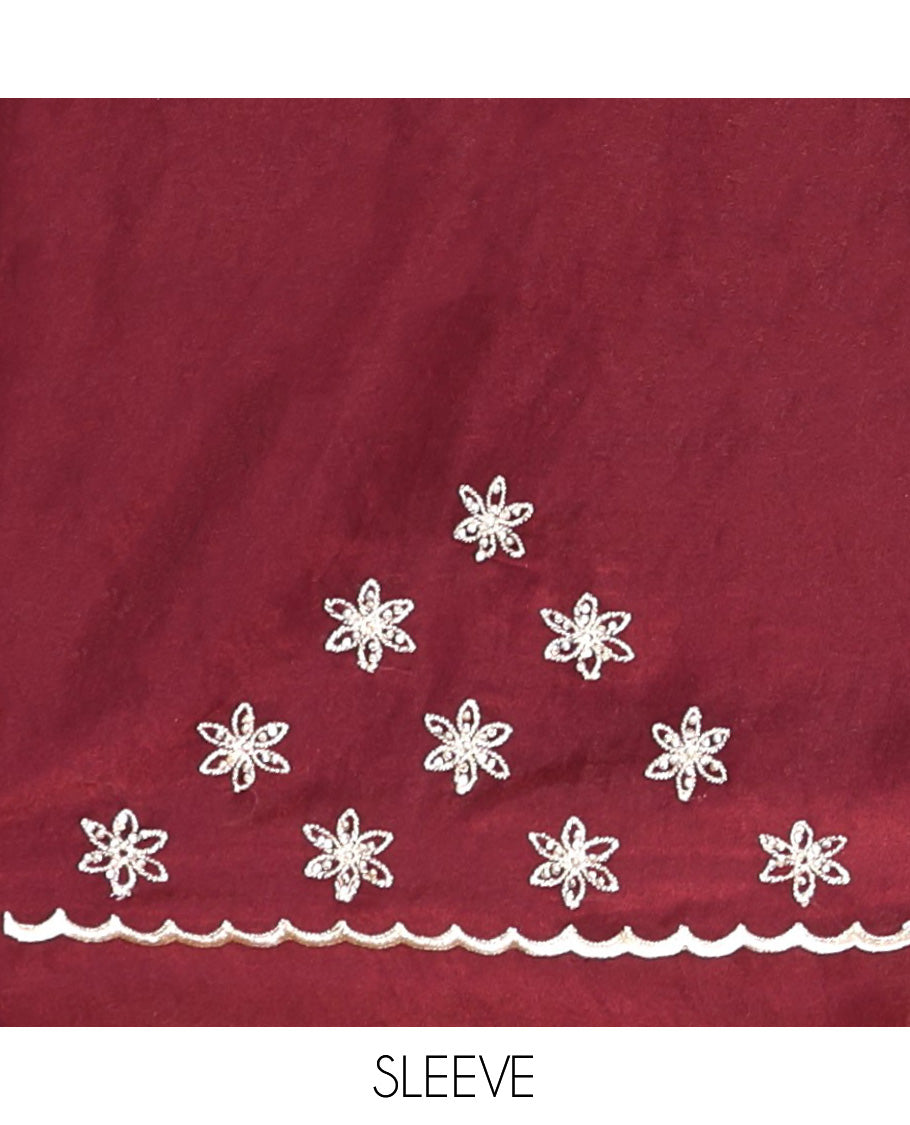 Wine Designer Saree, Decked Up with Floral Embroidered All Over Its Body, a Scallop Embroidered Border, and Matching Blouse