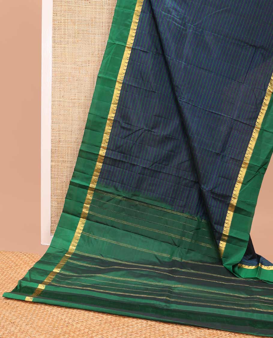 Blue striped kancheepuram silk saree with contrast ganga jamuna border of paisley, muthu, mayil design & zari design pallu