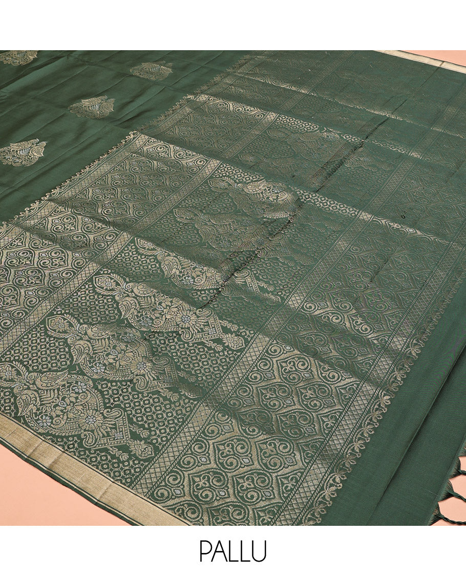 Green Mayuri Soft Silk Saree, Entralled with Zari Buttas All Over Its Body Highlighted iby Zari Piping Border, Intricately Designed Pallu and Paired with a Matching Blouse