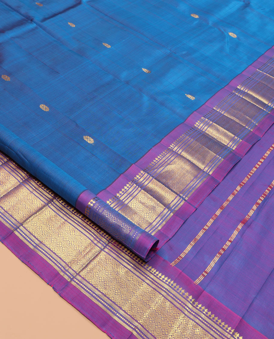 Blue Kanchipuram Silk Saree, Woven with Zari Buttas, a Contrast One-Sided Border of Panner Sombu, Banaras, Muthu, and Jaal Designs, Zari Design Pallu, and a No Blouse