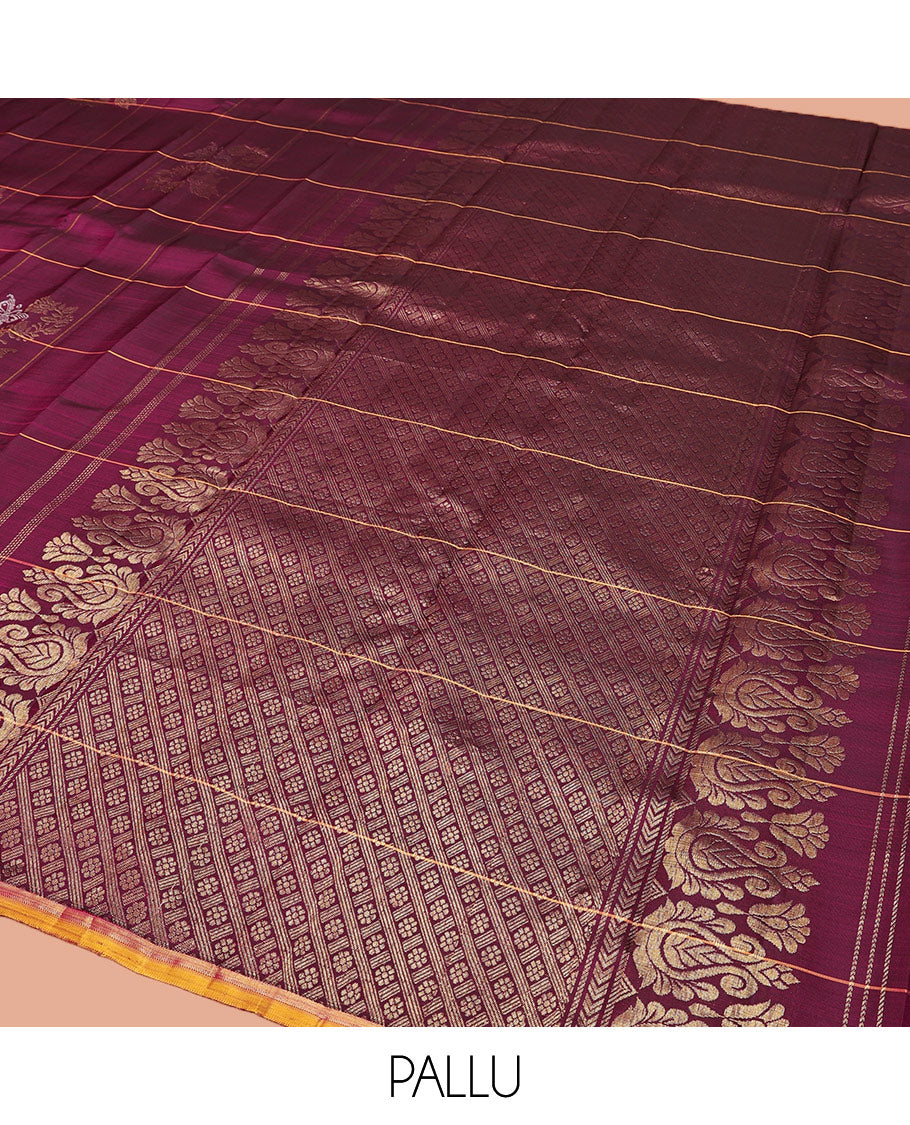 Borderless Wine Kanchipuram Silk Saree, Meticulously Crafted with Zari Buttas Enclosed Checks, Complemented by a Contrast Pallu Steeped with Kamalam Designs, and Paired with a Matching Blouse