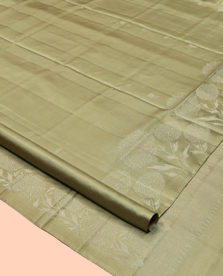 Green Mayuri Soft Silk Saree, Subtly Sparkled with Buttas, Subtle Floral Motif Border, Pallu of Floral Designs, and a Matching Blouse