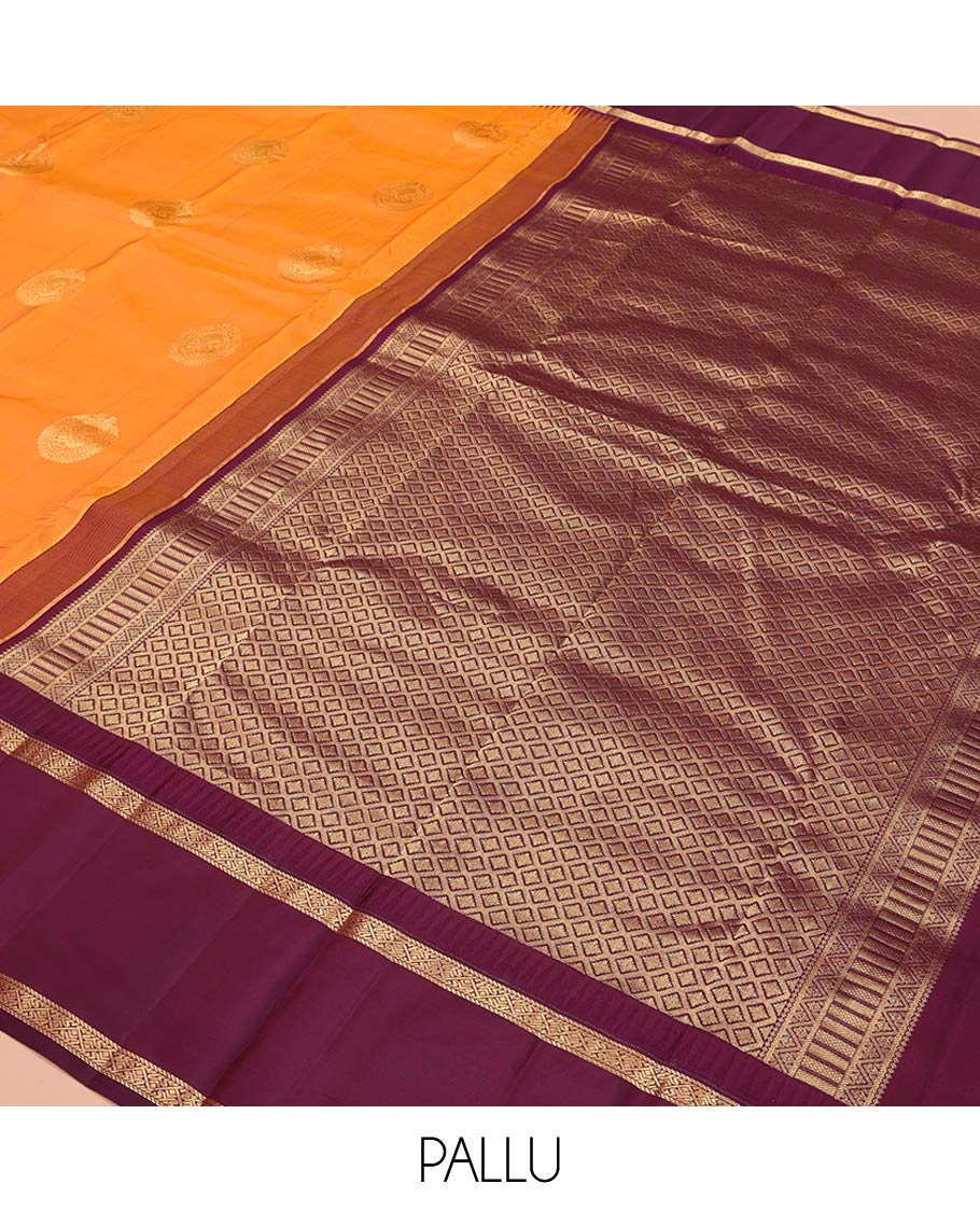 Orange Vasundhara Silk Saree, Delicately Woven with Zari Buttas All Over Its Body, Complemented by a Contrast Rettai Pettu Temple Border of Zari Designs, Grand Jaal Pallu, and Paired with a Contrast Blouse