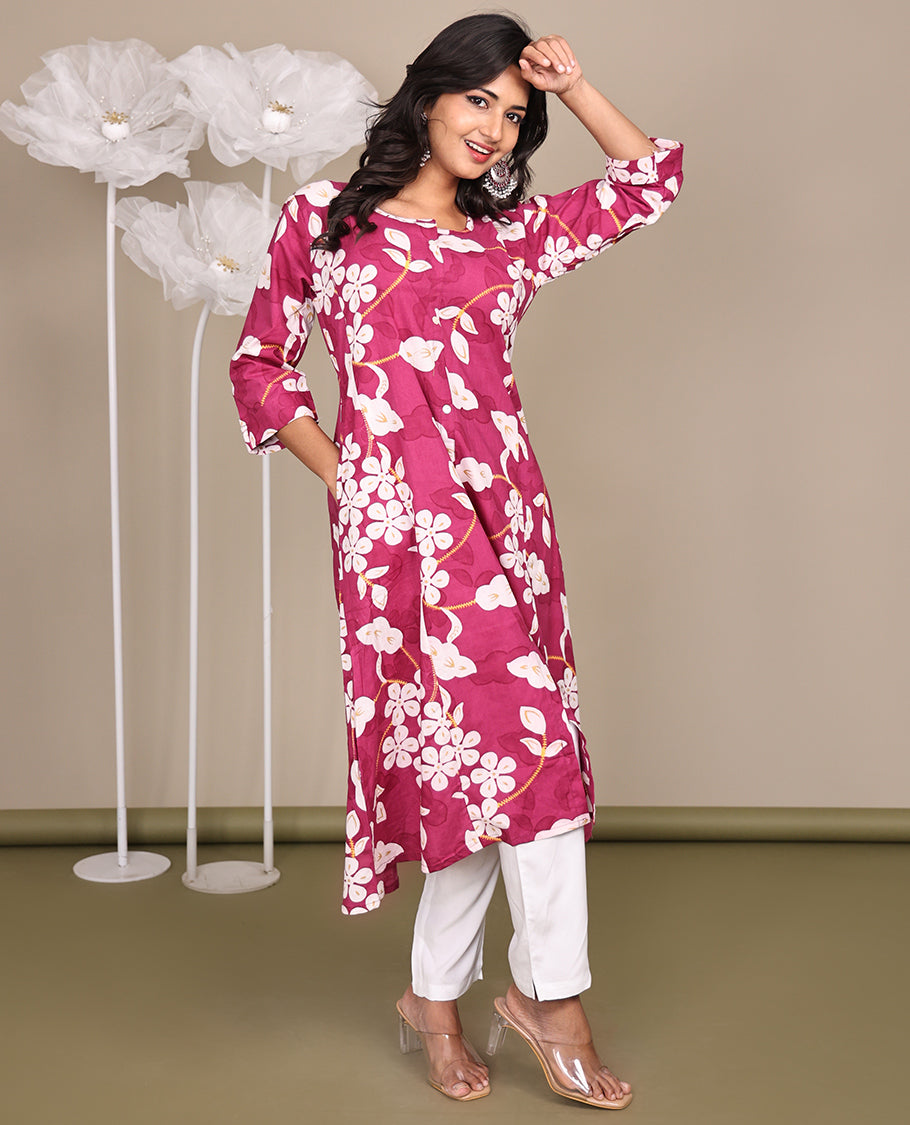 Pink Floral Printed Below-Knee-Length Cotton Kurti, Beautified with Round Neckline, 3/4 Sleeves, and A-Line Length