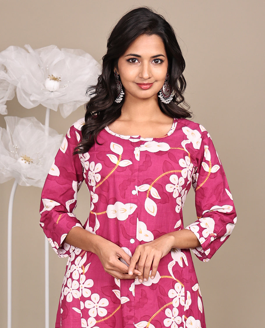 Pink Floral Printed Below-Knee-Length Cotton Kurti, Beautified with Round Neckline, 3/4 Sleeves, and A-Line Length