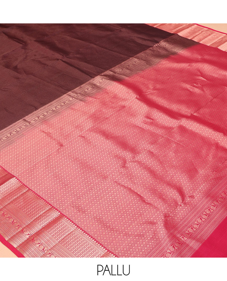 Maroon Vasundhara Silk Saree, Gleamed Up with Vaira Oosi Stripes, a Contrast Border of Thilakam Mokku, Muthu, Rettai Neli, Kathir, and Kodi Visiry Designs, Grand Pallu, and a Contrast Blouse