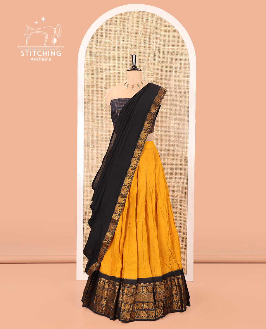 Yellow and Black Plain Sungudi Cotton Half-saree, Complemented by Captivating Contrast Traditional Zari Border of Temple, Peacock, and Elephant Designs, Paired with a Contrast Zari Checked Blouse, and Comes with a Zari-Bordered Vichitra Silk Dhavani