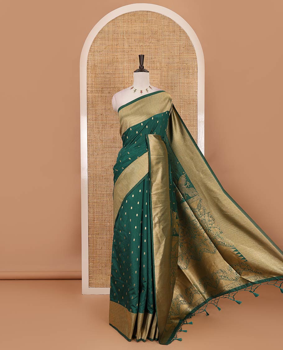 Forest green zari buttas dola silk saree, vanki zari border, checked blouse & pallu of iruthalai pakshi, kuthirai, kili & yaanai designs