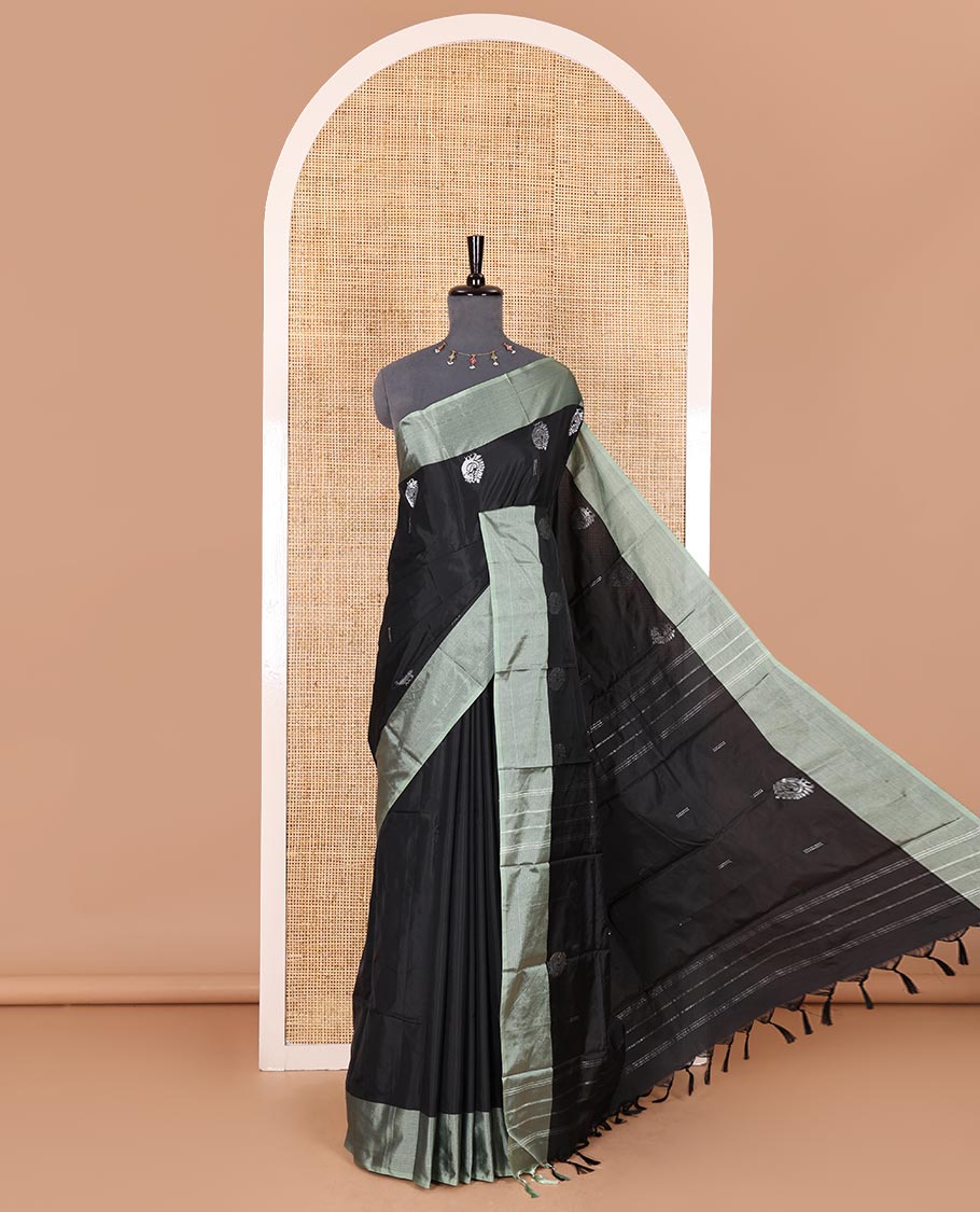 Black buttas and peacock buttas woven Kanchi silk saree, contrast satin zari striped border, zari design pallu, and a matching blouse