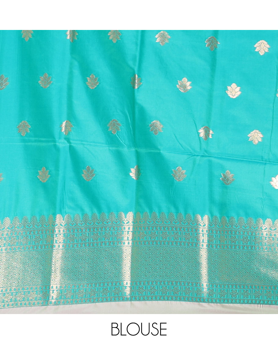 Borderless pista green chakra buttas enclosed, checked elite soft silk saree, contrast ogee patterned pallu, and contrast zari design blouse