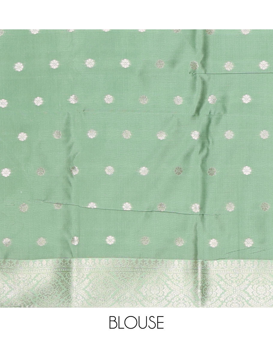 Brown-green floral buttas elite soft silk saree, contrast floral buttas border, and pallu of Mughal-style intricate zari designs