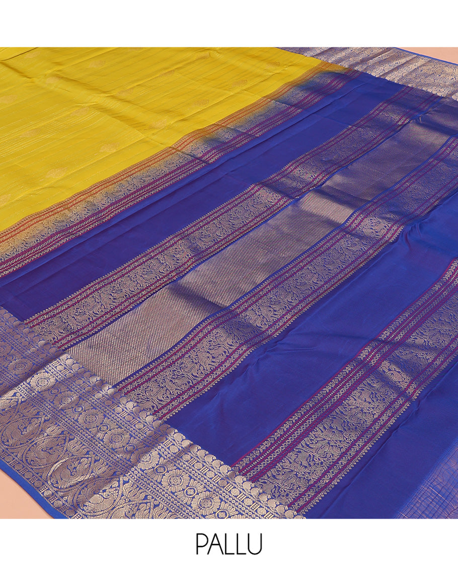 Green Vasundhara Lite Silk Mix Saree, Decked Up with Zari Designs, a Contrast Border of Manga Mokku, Rudraksham, Chakram, and Mayil Designs, Grand Pallu, and a Contrast Blouse