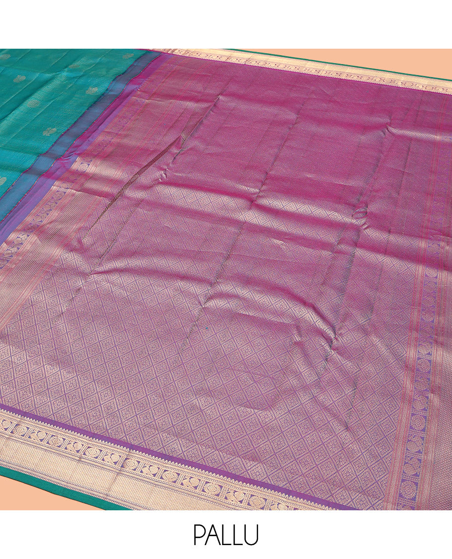 Blue Vasundhara Silk Saree, Embellished with Mayil-Chakra Buttas, Complemented by a Contrast Border of Rekku, Muthu, Kathir, Mayil, Chakram, and Mayil Kann, Jaal Pallu, and a Contrast Blouse