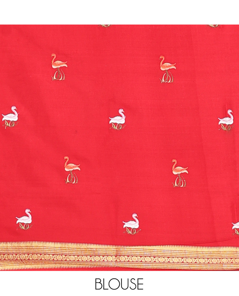 Green Mysore Silk Saree, Gleamed up with Zari Checked Design on its Body, Complemented by Captivating Contrast Border of Traditional Zari Designs, Pallu of Tropical Flora and Flamingo Bird Designs, and Paired with a Contrast Blouse