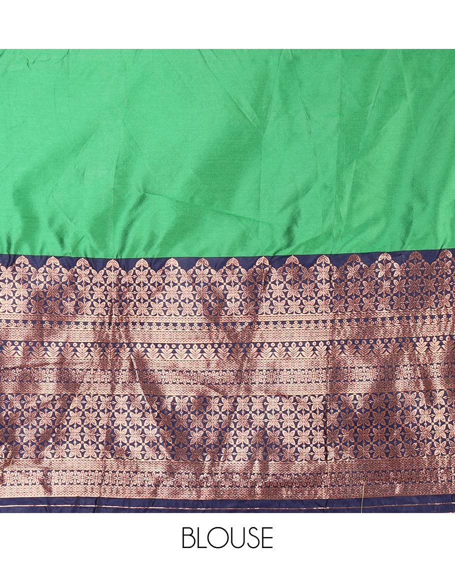 Green taffeta silk half saree, plain with contrast navy blue traditional zari big border, matching zari blouse, and contrast plain zari border dhavani