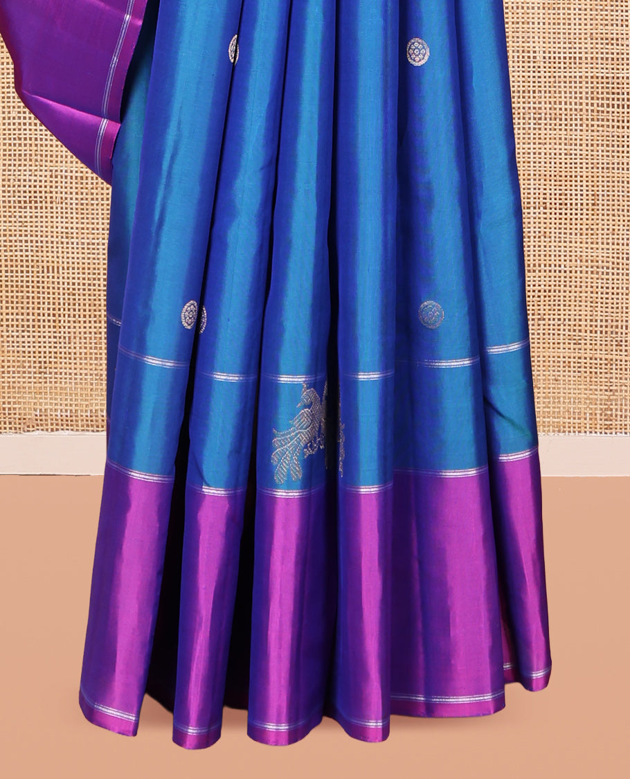Blue Kanchipuram Silk Saree, Prettified with Chakram and Pakshi Buttas, Complemented by a Contrast Border, Iruthalai Pakshi Motif Woven Pallu, and a Contrast Blouse