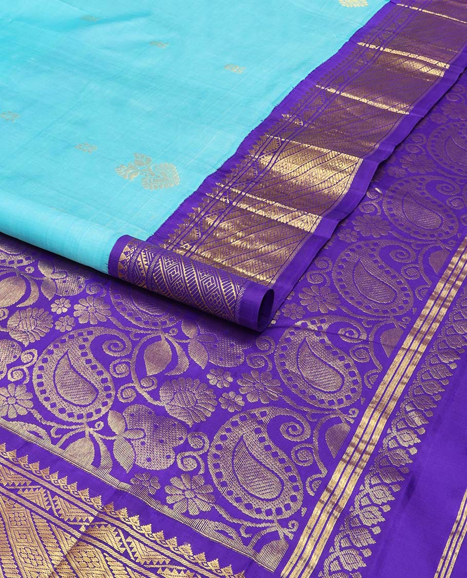 Blue floral design kancheepuram silk saree with contrast border of intricate zari design & floral vine design pallu