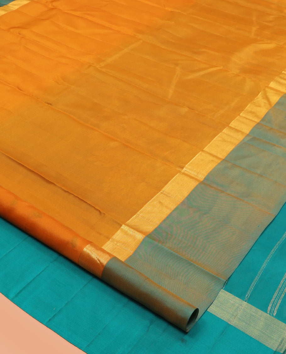 Orange Kanchipuram Silk Saree, Woven with Floral Zari Buttas, a Contrast Floral Zari Design Border, Floral Design Pallu, and a Contrast Blouse