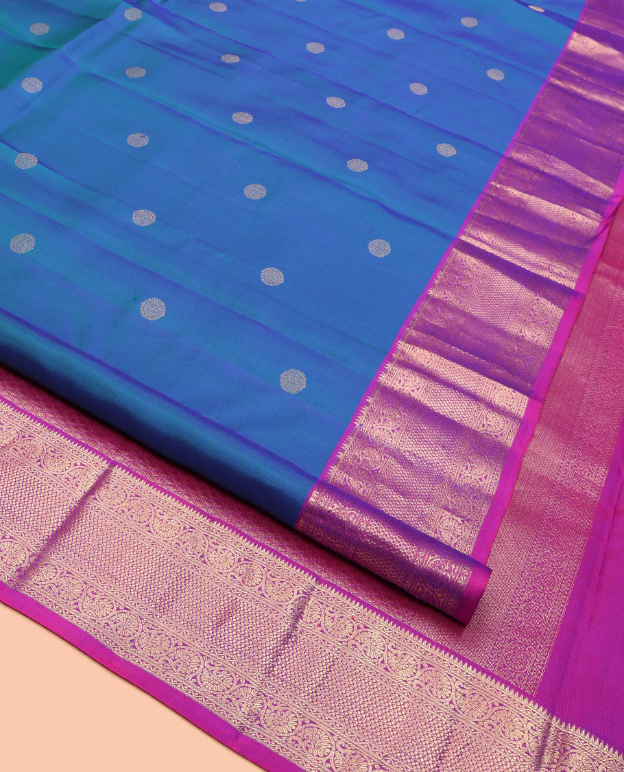 Blue Kanchipuram Silk Saree, Showcasing Zari Buttas All Over Its Body, Complemented by Contrast Border of Rekku, Neli, and Kodi Visiry Designs, Grand Jaal Pallu, and Paired with a Contrast Blouse