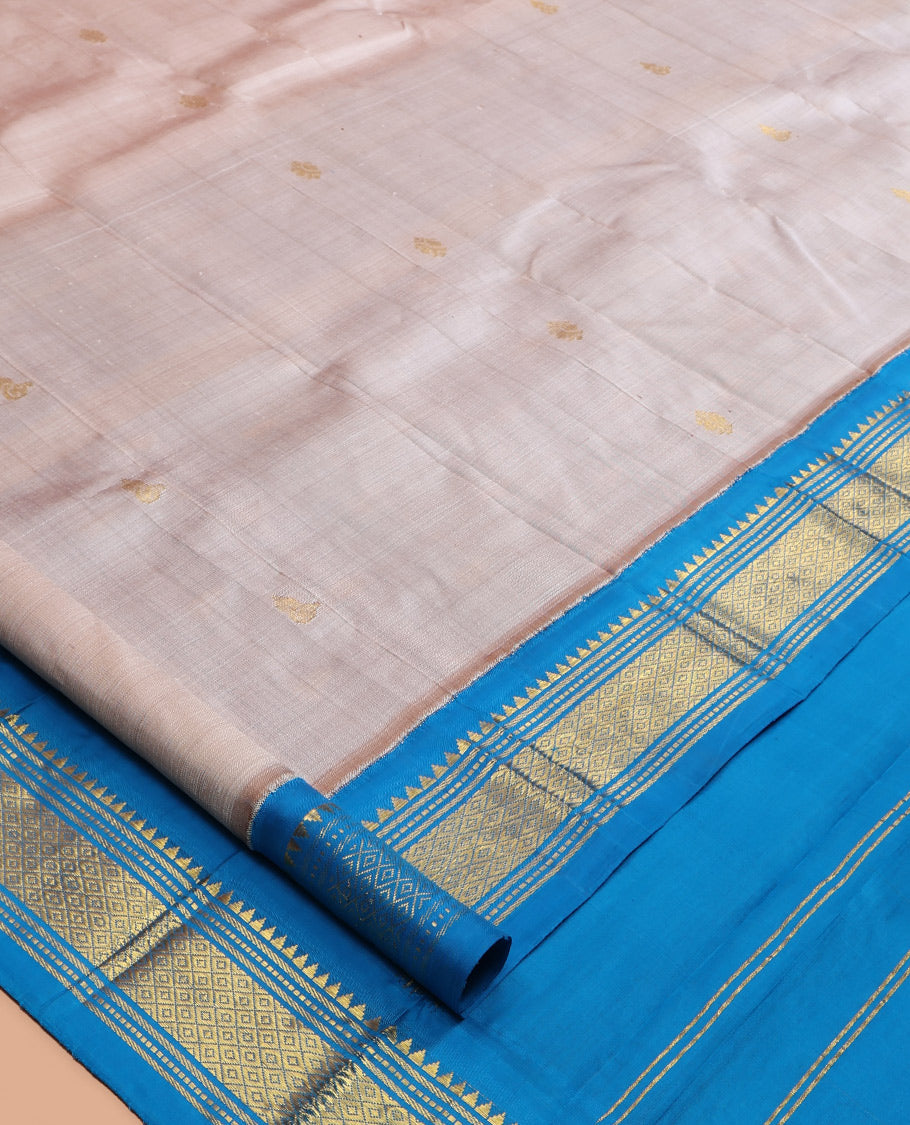 Grey Kanchipuram Silk Saree, Woven with Zari Buttas, a Contrast One-Sided Korvai Border of Rekku, Banaras, Muthu, and Mayil Kann Designs, Zari Design Pallu, and No Blouse