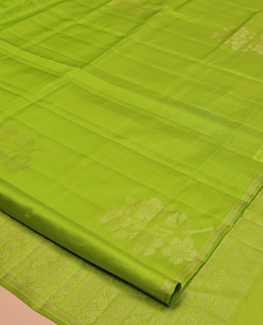 Borderless Green Mayuri Lite Silk Mix Saree, Charmingly Accented with Floral Zari Buttas All Over Its Body, Highlighted by a Pallu of Geometric Designs, and Paired with a Matching Blouse