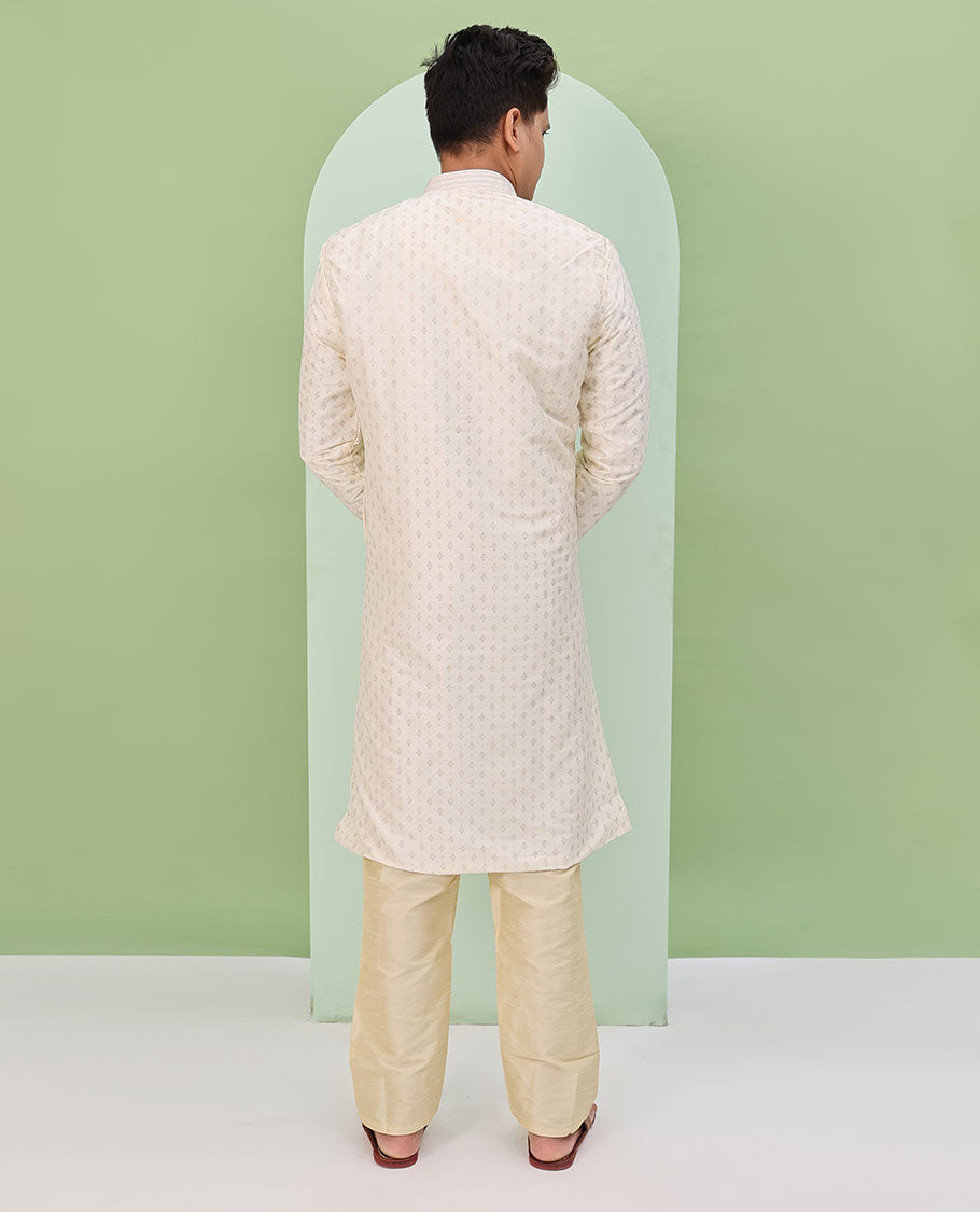 Light cream antique golden color buttas, and neck embroidered full-sleeved readymade kurta