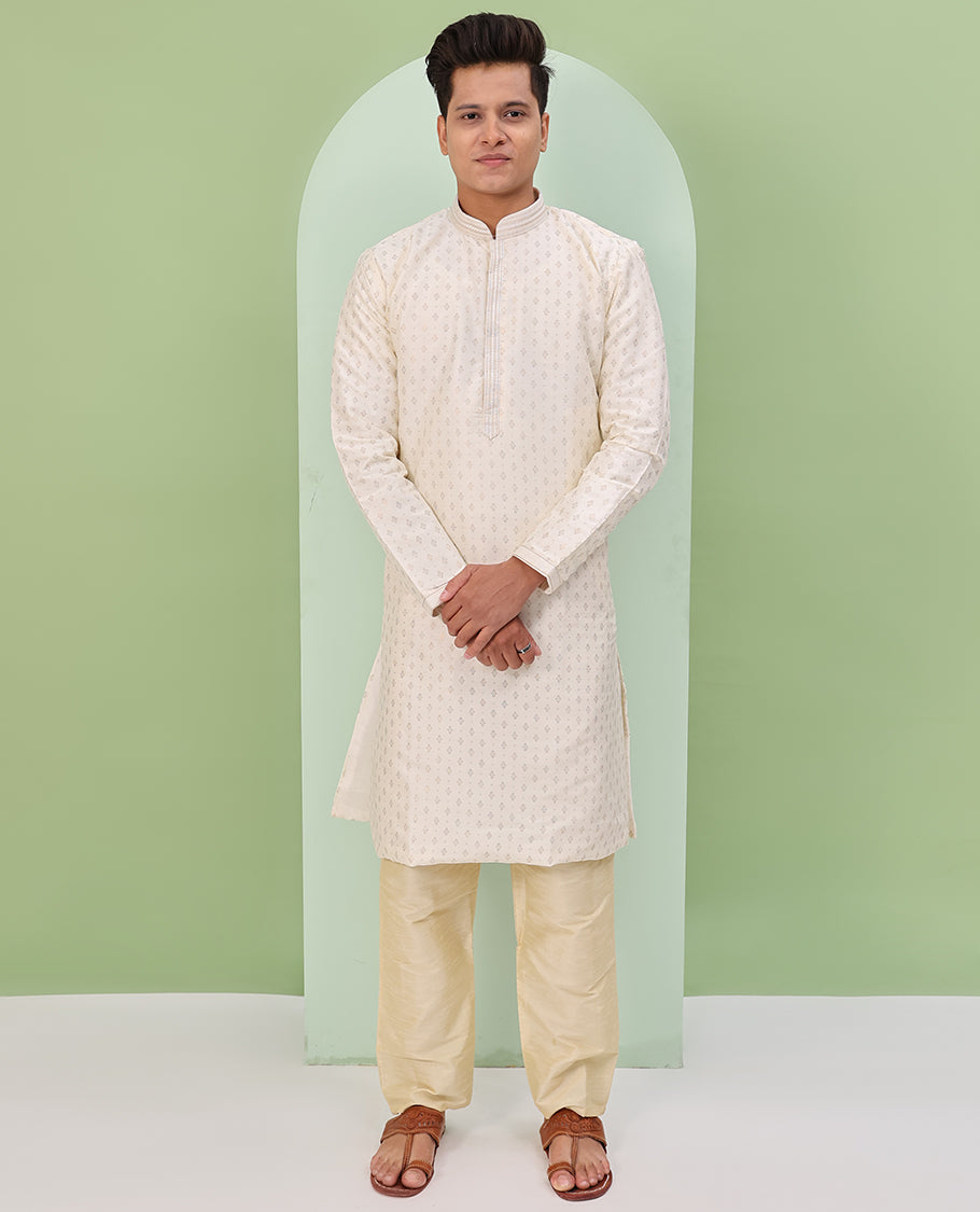 Light cream antique golden color buttas, and neck embroidered full-sleeved readymade kurta