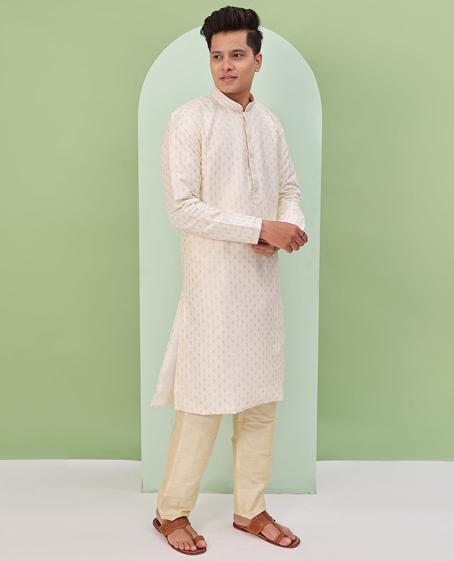 Light cream antique golden color buttas, and neck embroidered full-sleeved readymade kurta