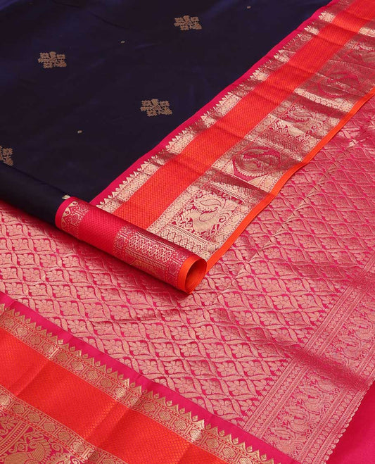 Blue zari buttas silk saree, contrast border of Muthu, rudraksham, mayil kann, poun, kamalam, manga and mayil and jaal pallu