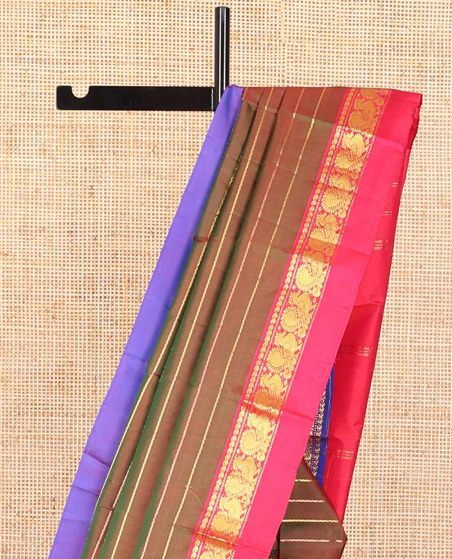 Mustard striped kancheepuram silk saree with contrast ganga jamuna border of thilakam mokku, banaras, paun design & zari design pallu