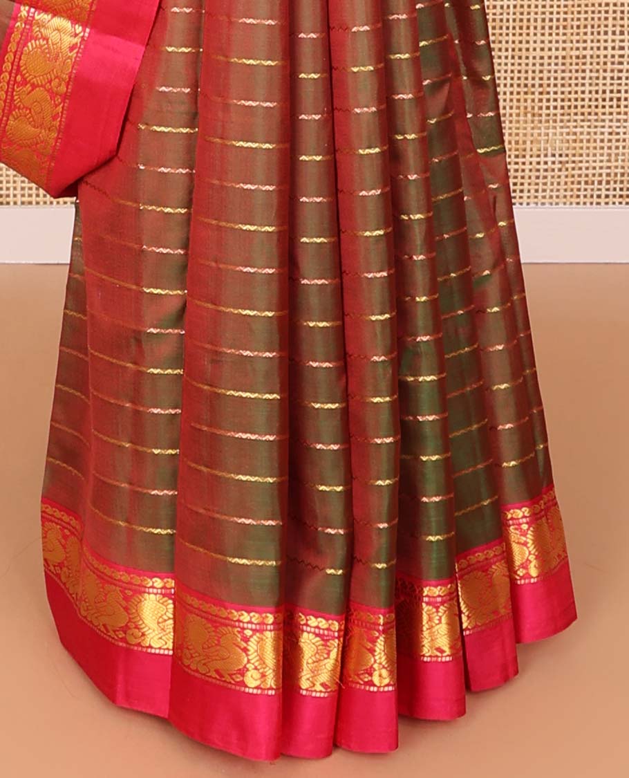 Mustard striped kancheepuram silk saree with contrast ganga jamuna border of thilakam mokku, banaras, paun design & zari design pallu