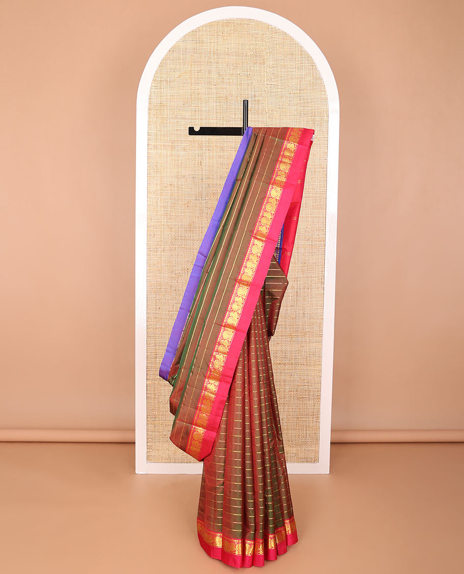 Mustard striped kancheepuram silk saree with contrast ganga jamuna border of thilakam mokku, banaras, paun design & zari design pallu