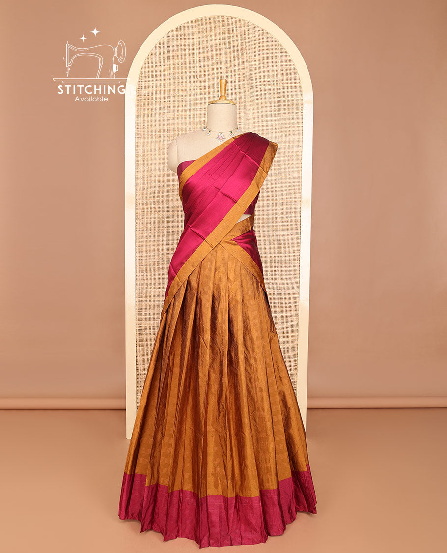 Brown striped half saree with contrast border, plain blouse & plain, checked border dhavani