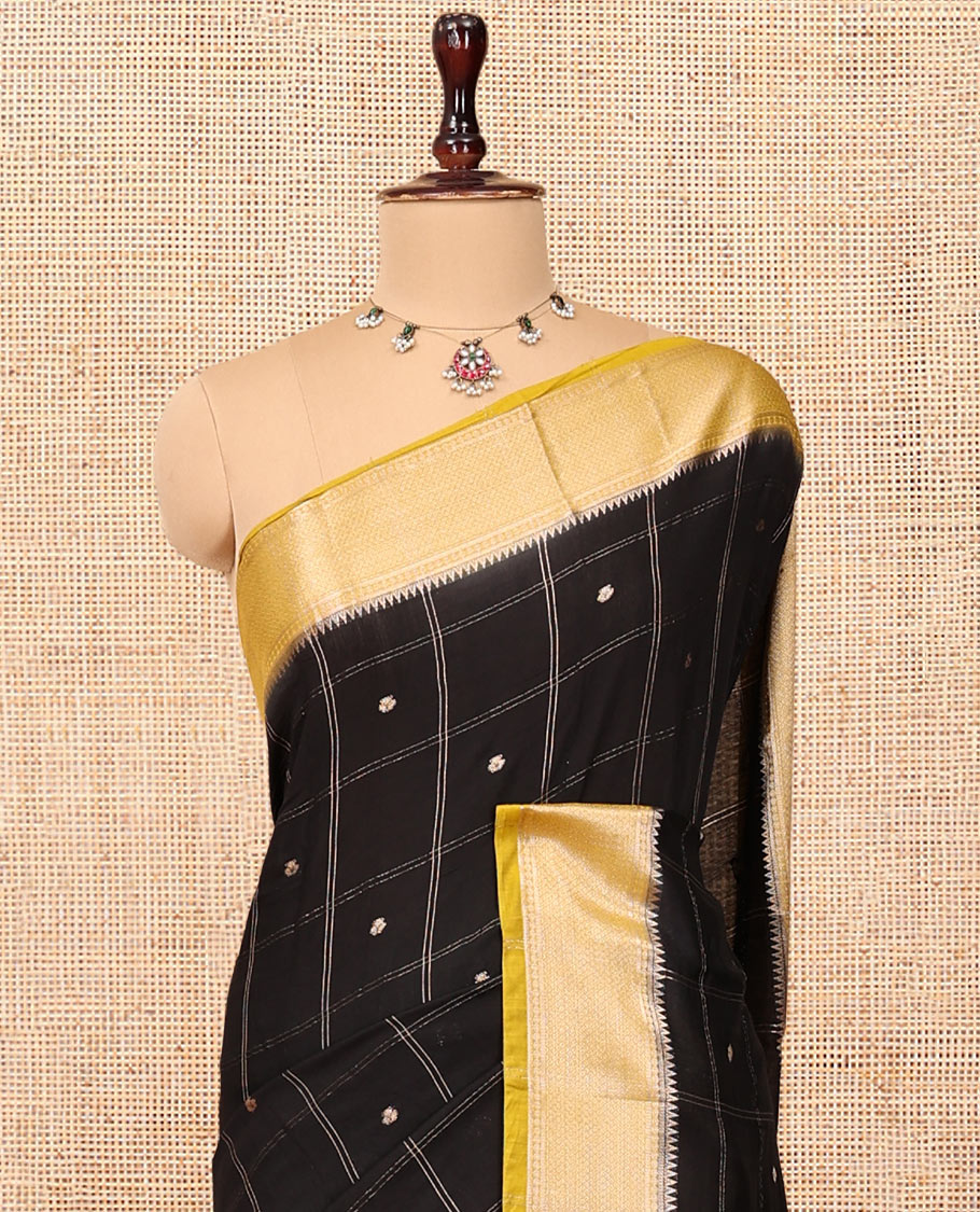 Black Assam Silk Saree, Gracefully Embellished with Zari Butta Enclosed Checks, Complemented by Contrast Traditional Zari Border, Striped Pallu, and a Contrast Blouse