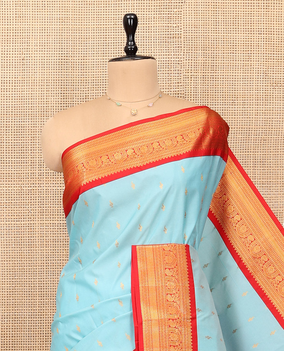 Violet Budget Silk Saree, Styled with Floral Zari Buttas, Complemented by a Contrast Traditional Zari Border, Grand Pallu, and Contrast Blouse