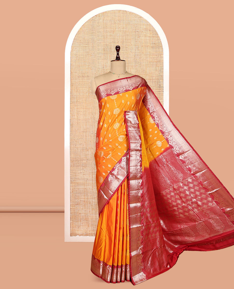Orange Budget Silk Saree, Detailed with Zari Buttas, Complemented by a Contrast Traditional Border, Pallu of Jaal and Paisleys, and a Contrast Blouse