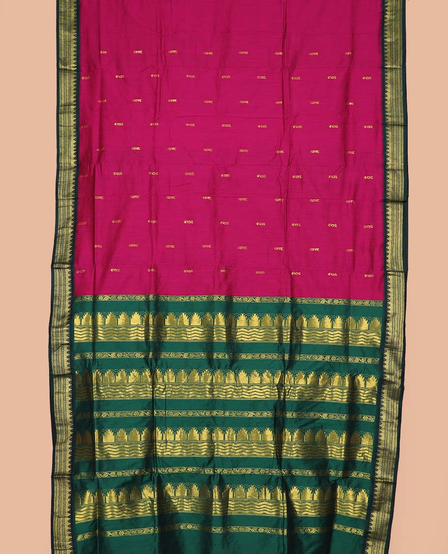Pink buttas nine-yard cotton saree, contrast traditional zari border, and pallu steeped with traditional motifs