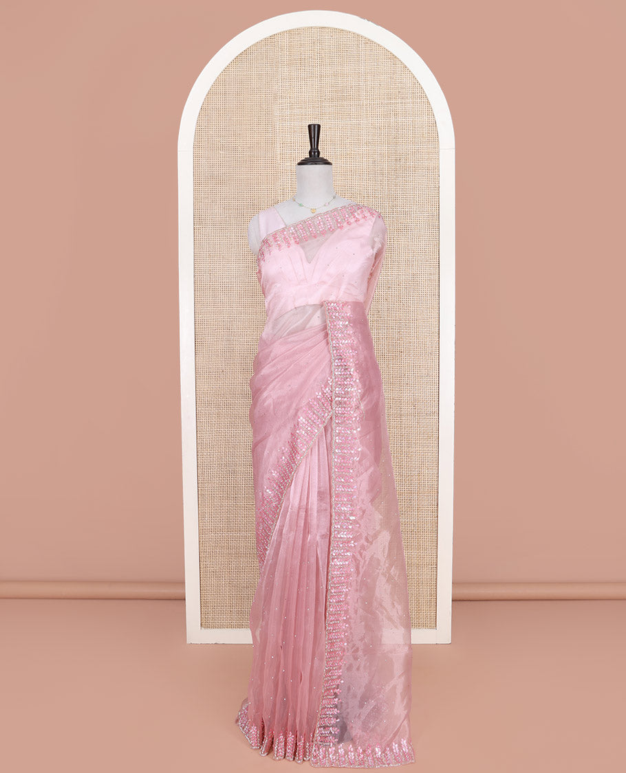 Pink Designer Saree, Subtly Sparkled with Stone Work on Its Body, Highlighted by a Scallop Floral-Themed Stone-Thread Embroidered Border, Self-Pallu, and Paired with a Matching Blouse