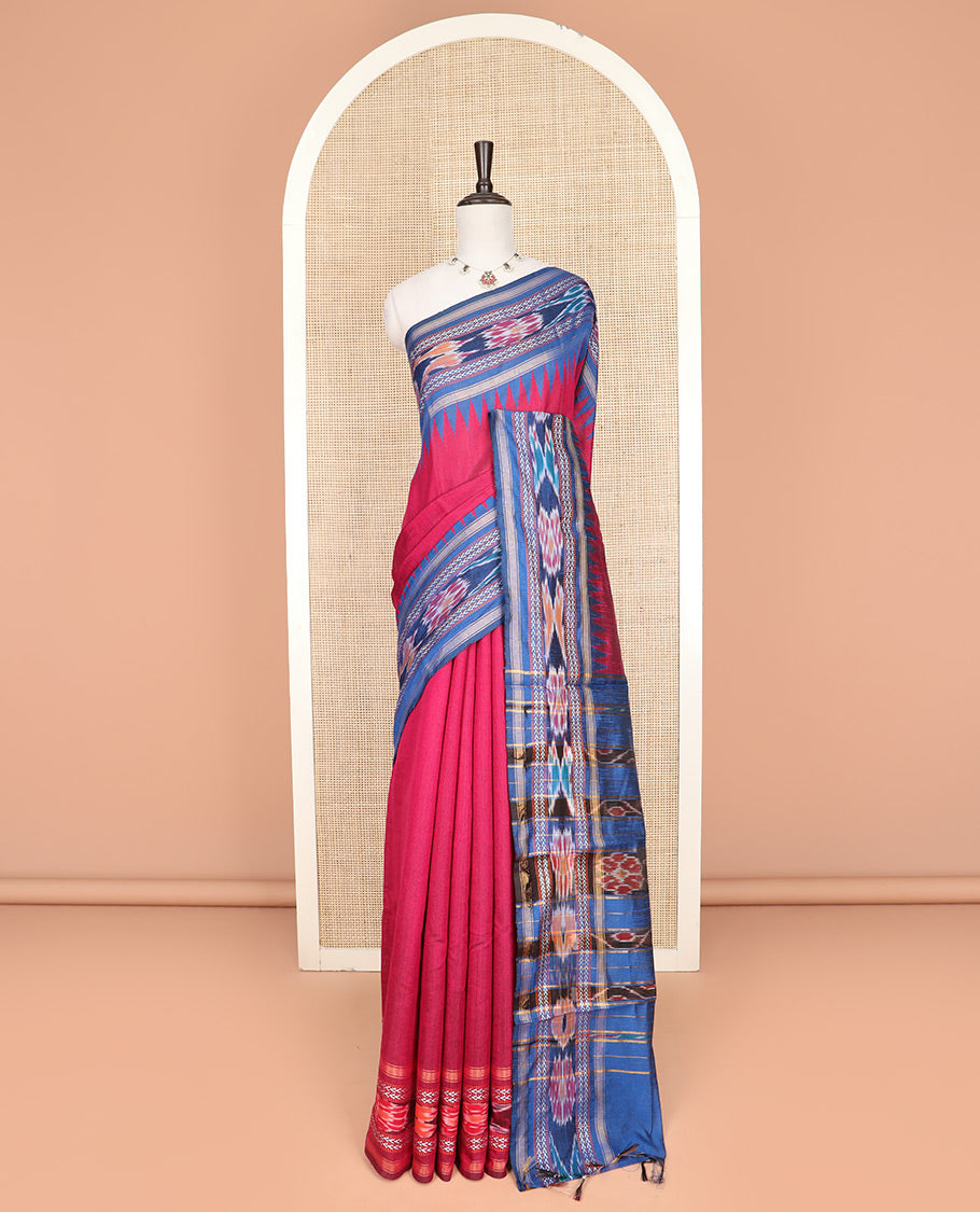 Pink Plain Dupion Silk Saree, Captivated by a Contrast Temple Border of Geometric Patterns and Ikkat Weave, Pallu Depicting Floral Ikkat Designs, and Paired with a Contrast Blouse