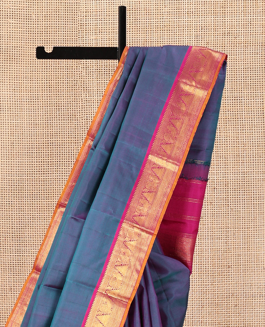 Blue Plain Kanchipuram Silk Saree, Complemented by a Contrast Border of Rekku, Muthu, Mayil Kann, Mayil, Thazampoo Rekku, and Zari Stripes, Pallu of Zari Designs, and Paired with a Contrast Blouse