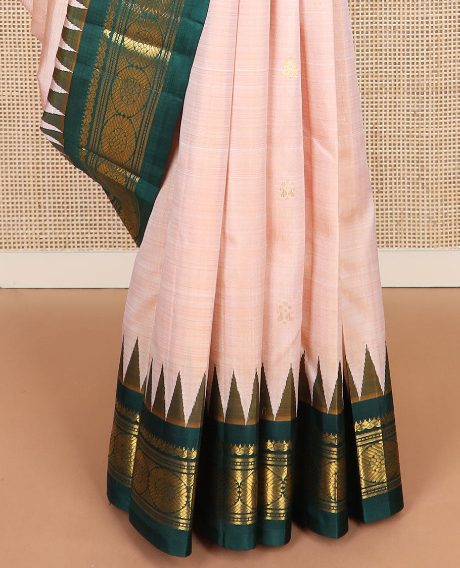 Sandal zari buttas kanchipuram silksaree,contrast one-sided thazampoo rekku border of salngai,muthu,banaras & chakram & zari design pallu